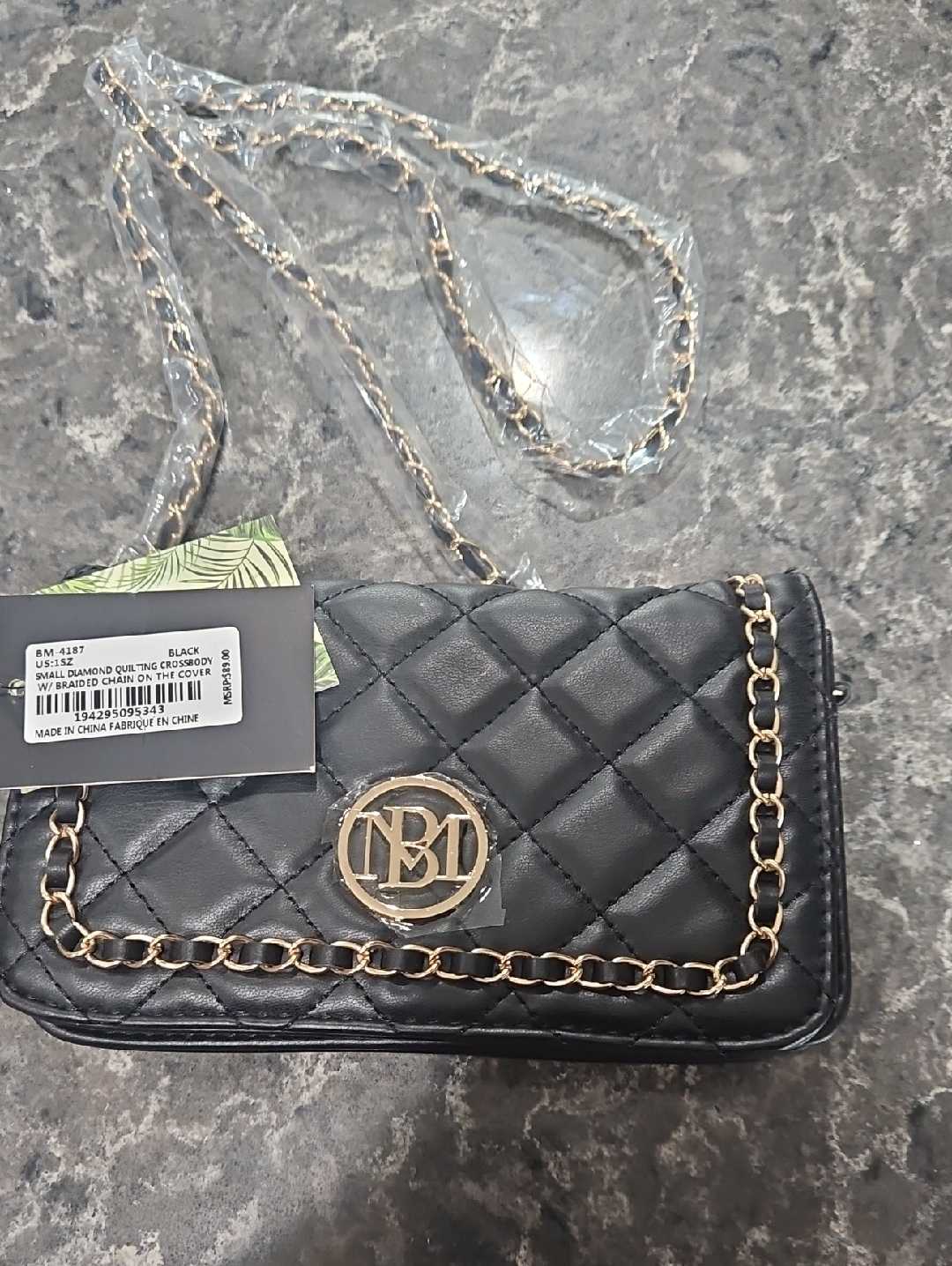 Quilted Black Crossbody Bag With Gold Chain And Logo Accent